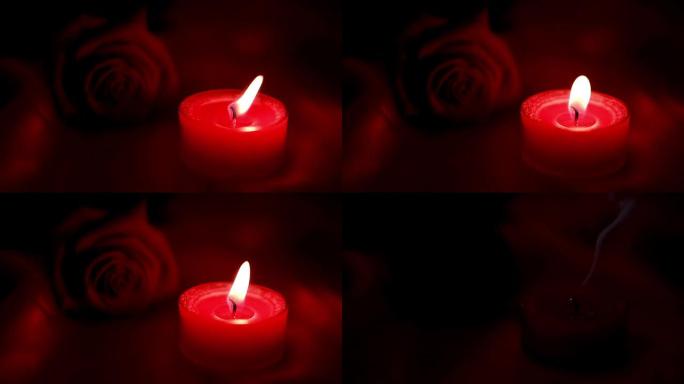 蜡烛在红玫瑰旁边闪烁，出去