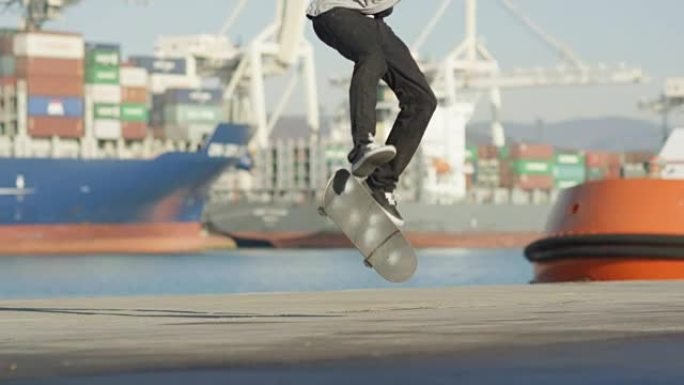 慢动作滑板跳车在港口滑板上表演高跟鞋技巧