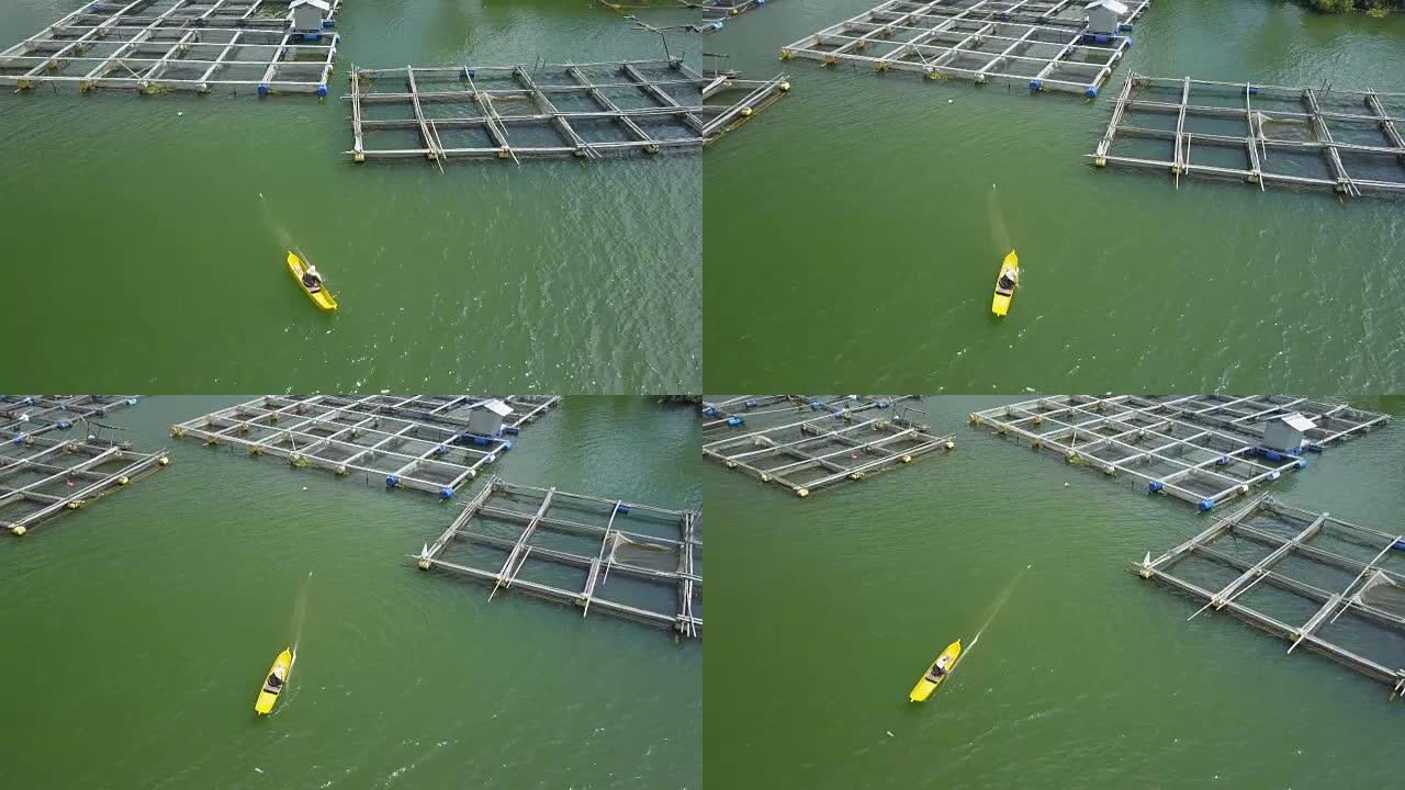 空中: 村民在巴图尔湖上钓鱼并从水中拉网