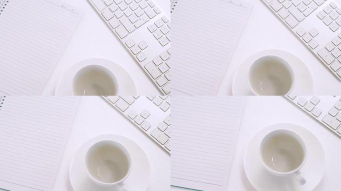 白色背景4k键盘、整理器、杯子和碟子