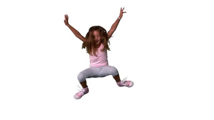 可爱的小女孩跳着四肢在白色背景上伸展