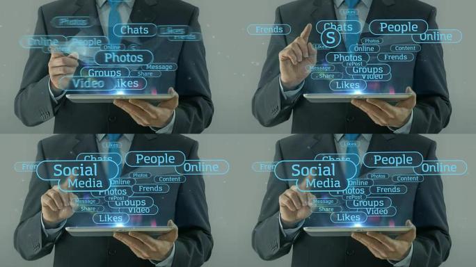 商人指向社交媒体网络概念平板电脑