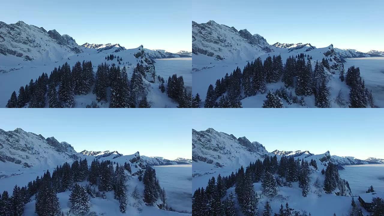 Establishing shot of snowy mountain top landscape 