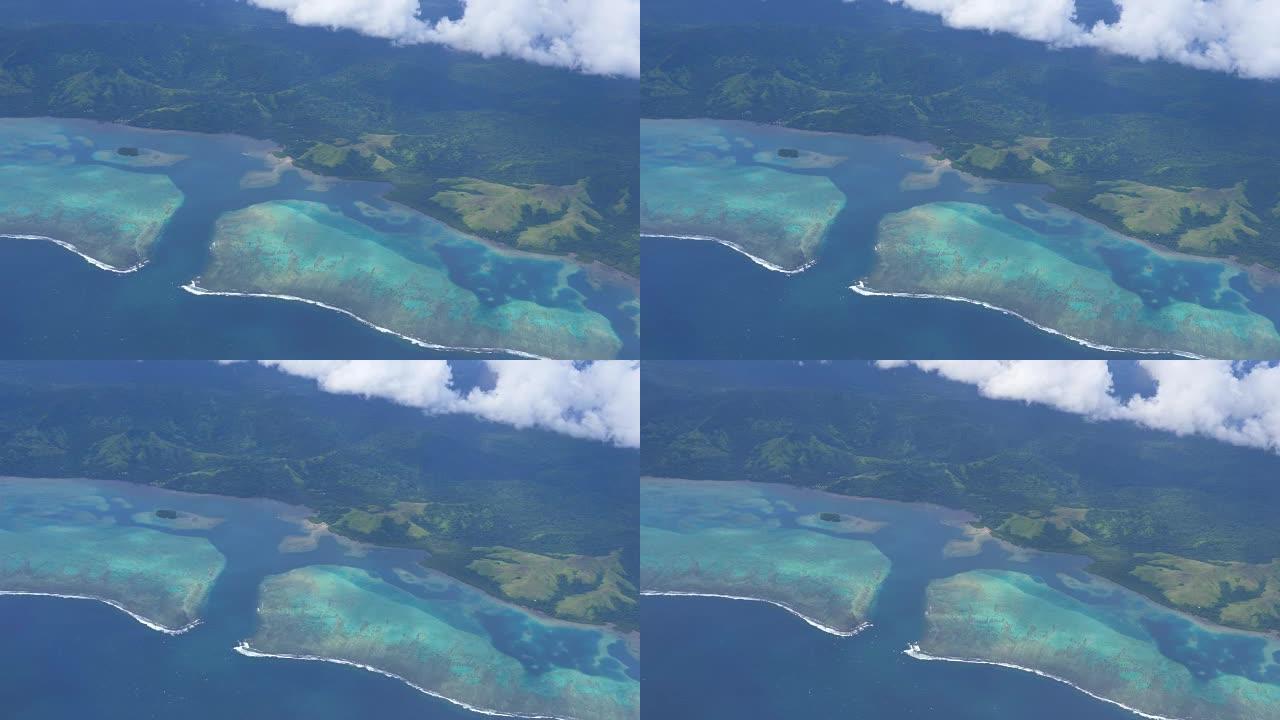 空中慢动作: 斐济岛和濒临灭绝的珊瑚礁的壮丽景色。