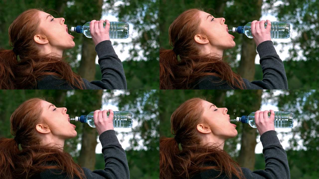 红发女郎从外面的瓶子里喝水