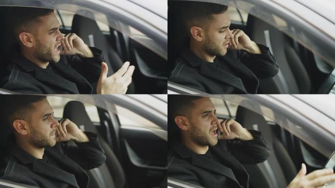 压力大的商人坐在户外车内时发誓和打电话的特写镜头