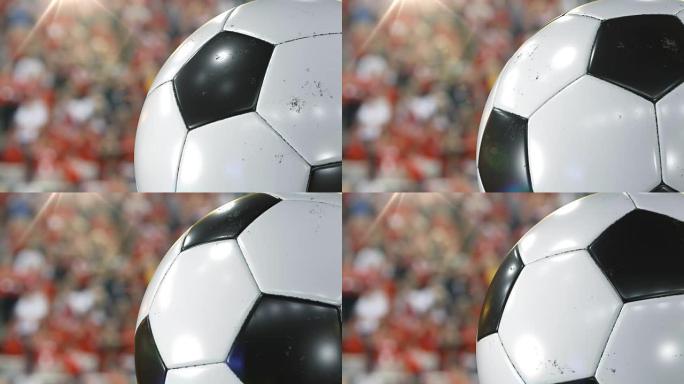 美丽的足球旋转特写镜头在体育场背景下慢动作。转球的循环足球3d动画。4k UHD 3840x2160