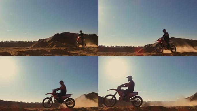 职业摩托车越野赛FMX摩托车骑手在沙丘上和越野车道上行驶的长镜头。