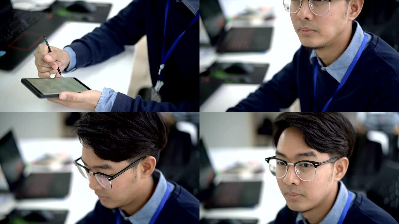 亚洲男子在智能手机上做笔记