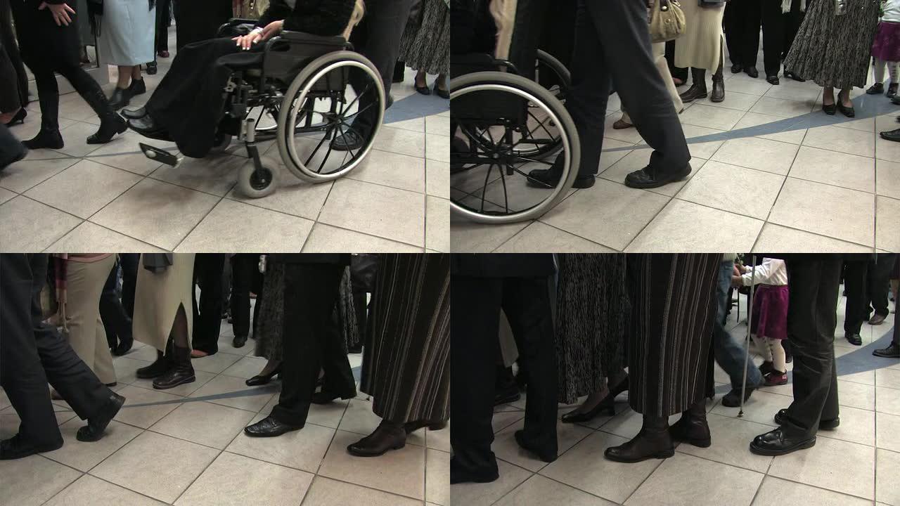 各种各样的人排队排队轮椅