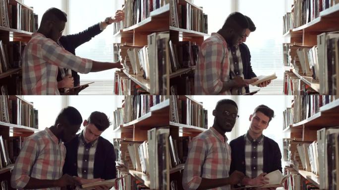 男学生在图书馆找书