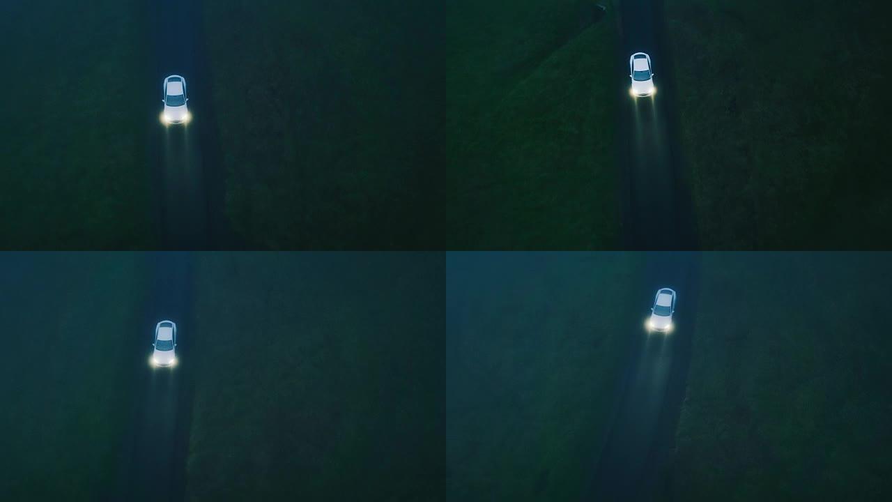 在乡村道路上行驶的鸟瞰图电动汽车