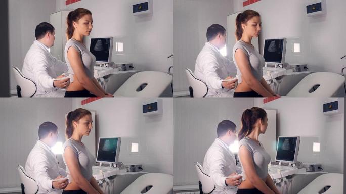 对妇女的腰进行超声波检查。4K