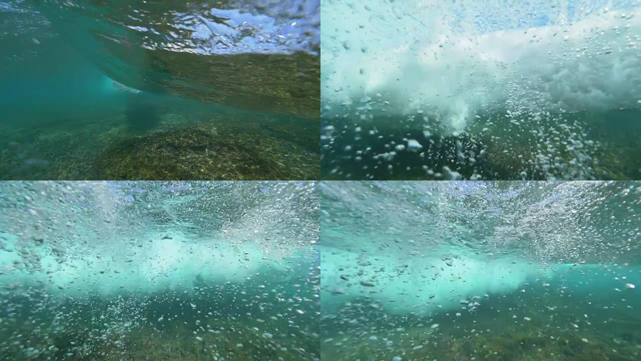 慢动作水下桶波在火山洛博斯岛的相机上破裂
