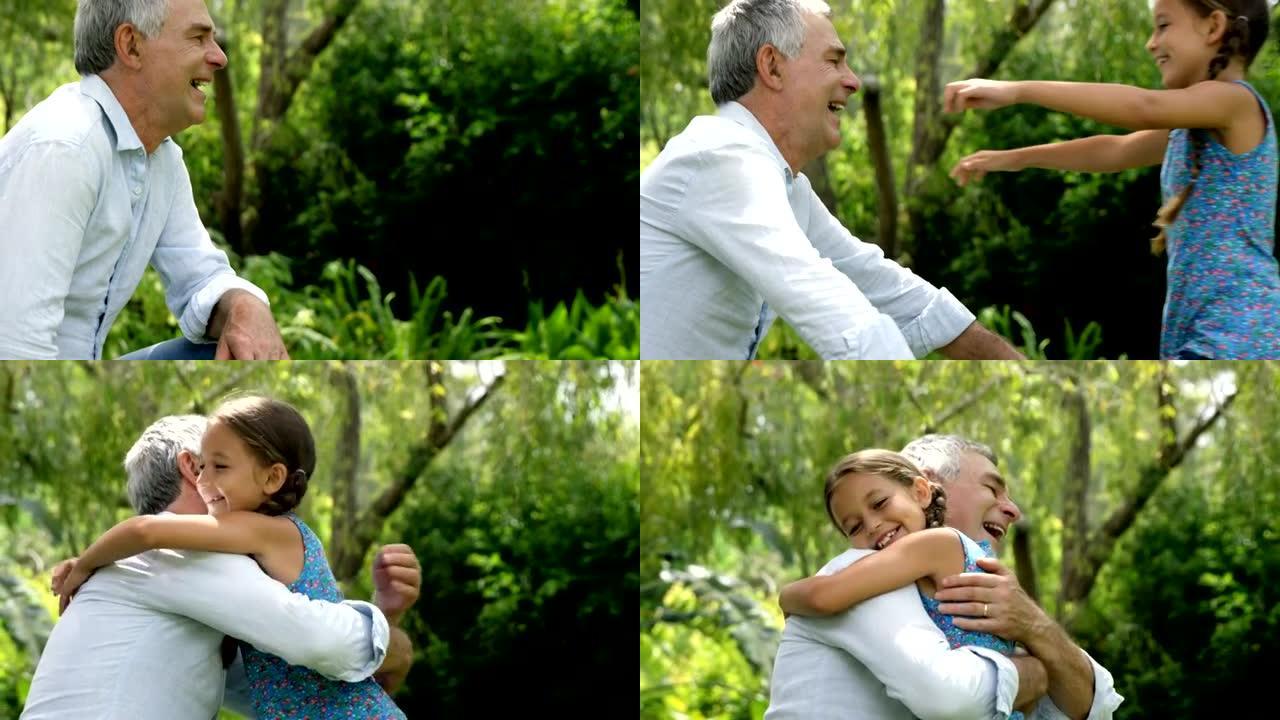 成熟的男人拥抱他的孙女