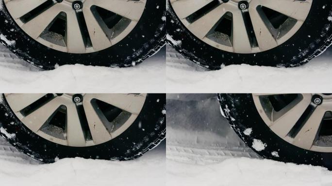 降雪期间汽车轮胎在雪地上行驶