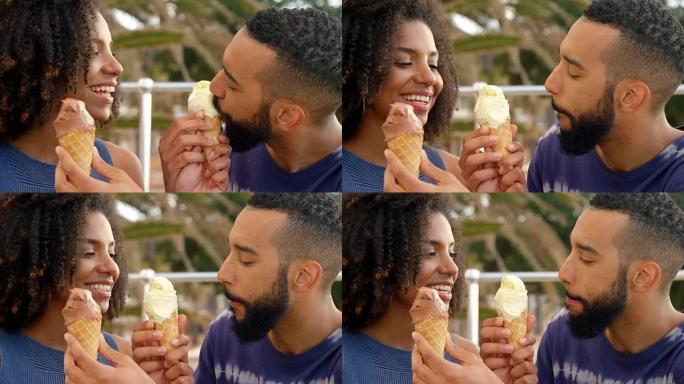 夫妇在4k海滩吃冰淇淋蛋卷