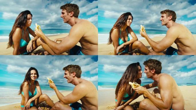 年轻人以慢动作向迷人的年轻女子喂食香蕉
