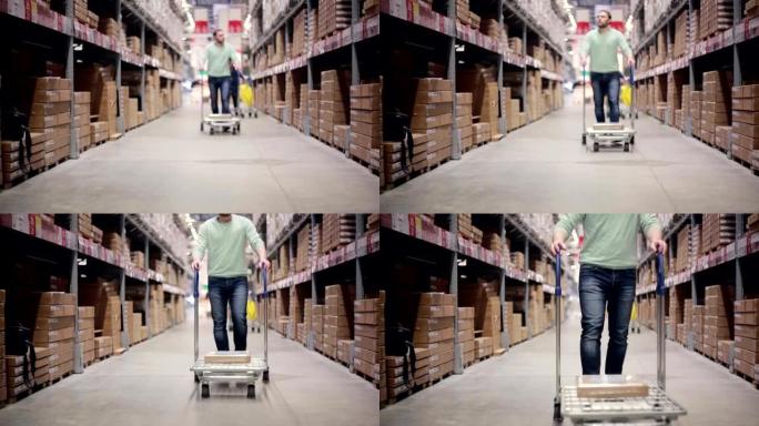 在一个仓库里，一名男子推着一辆推着一个箱子的手推车进入摄像头，慢慢聚焦