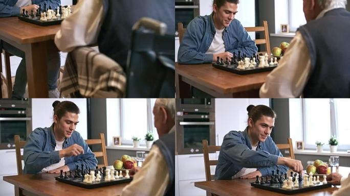 祖父与成年孙子下棋