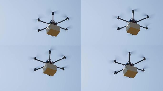 特写: 直升机无人机运送未来派包裹。空运货物
