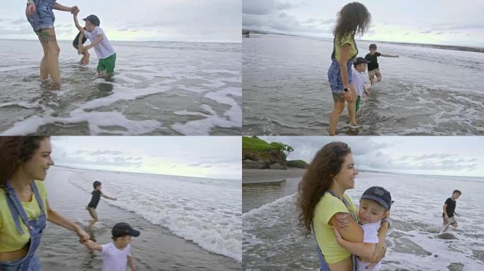 儿童在热带海滩上玩水