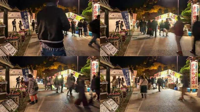 延时: 晚上在名古屋korankei跳蚤市场拥挤的行人