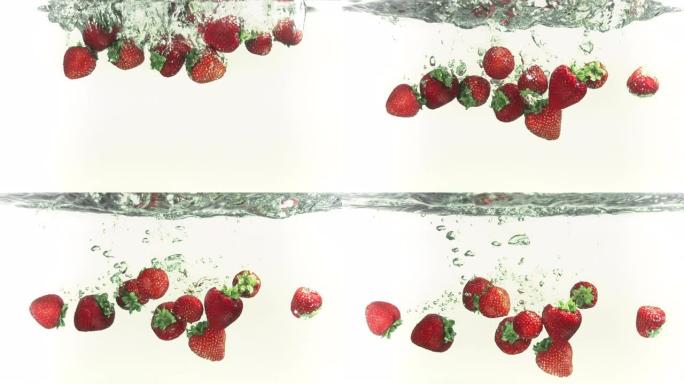 草莓以慢动作溅入水中