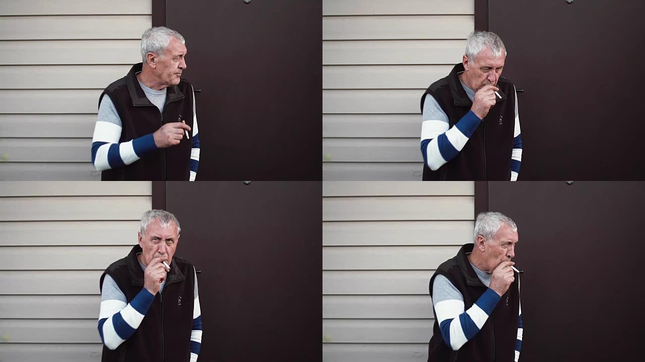 一位老人站在墙边抽烟。慢mo