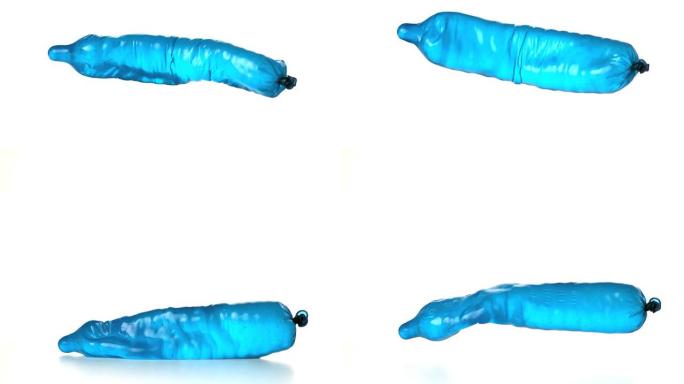 装满水的蓝色避孕套掉落和弹跳