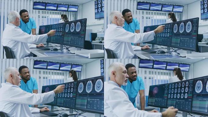 医学科学家和外科医生在实验室的个人计算机上讨论CT/MRI脑部扫描图像。神经学研究中心的神经学家/神