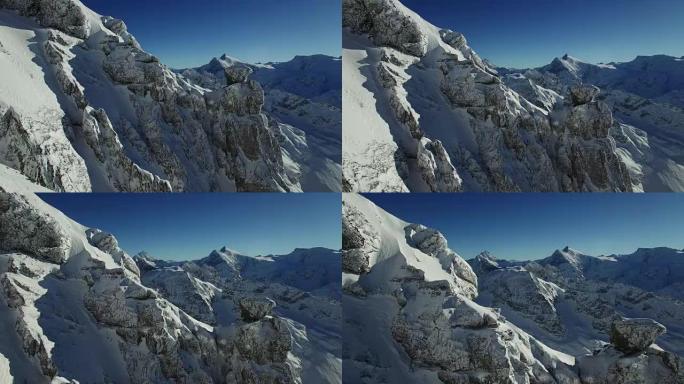 Establishing shot of snowy mountain top landscape 