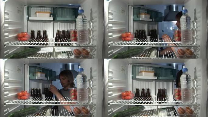 冰箱里面-男人得到一个啤酒高清和PAL
