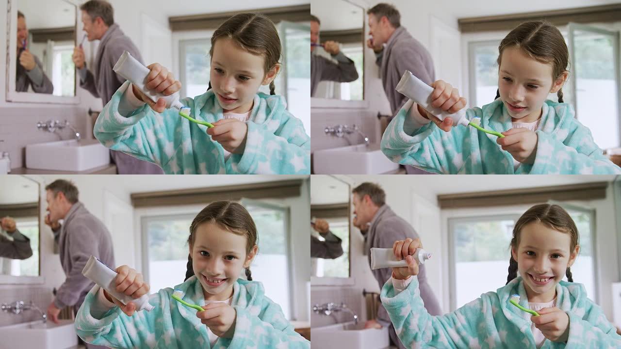 快乐女孩在牙刷上粘贴牙膏4k