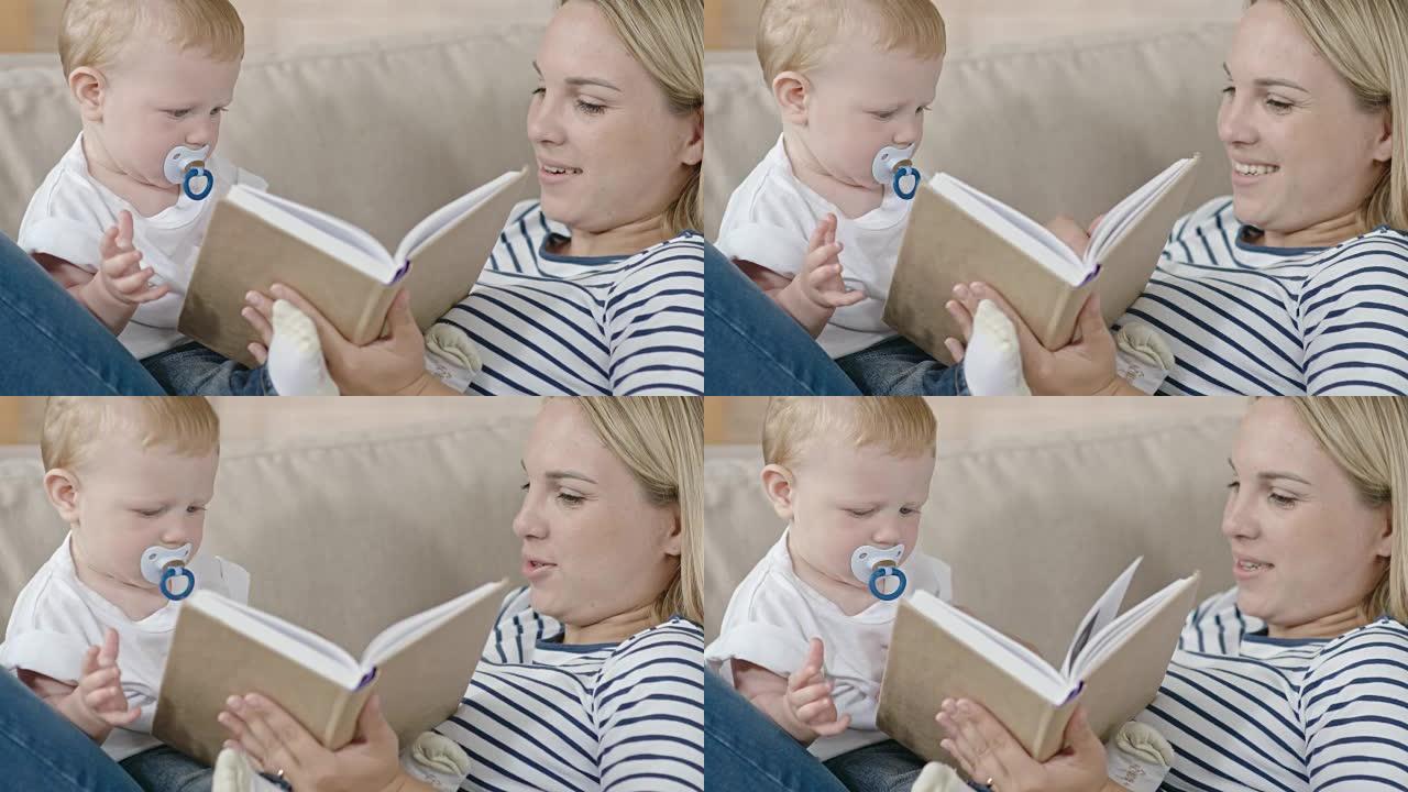 年轻的母亲给婴儿读故事