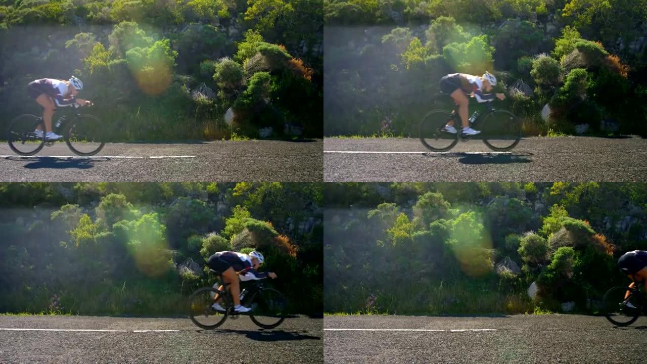 女自行车手在乡村道路上骑自行车4k