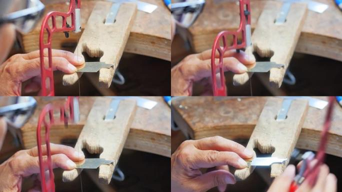 手工艺者使用钢锯