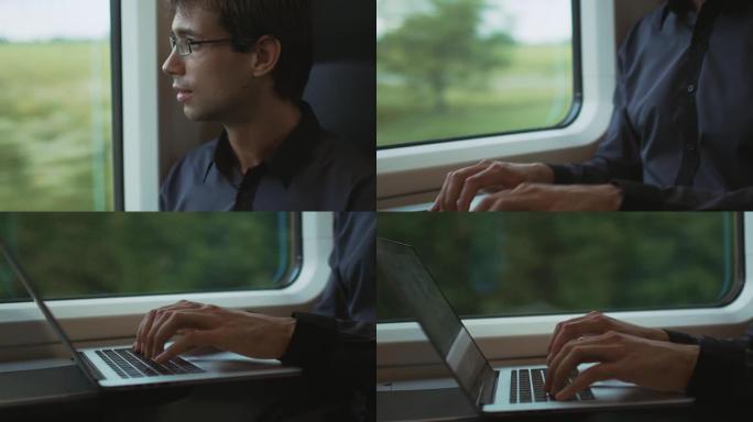 在火车上旅行期间在笔记本电脑上工作的人