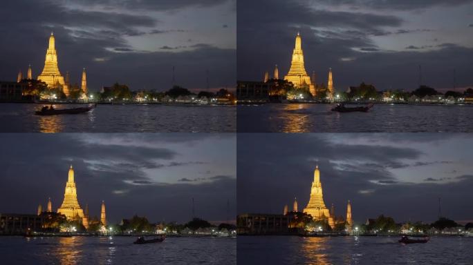 泰国曼谷的Wat Arun寺夜景，位于湄南河西岸。平移镜头