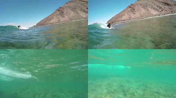 慢动作: 冲浪女孩冲浪波，水面下的相机