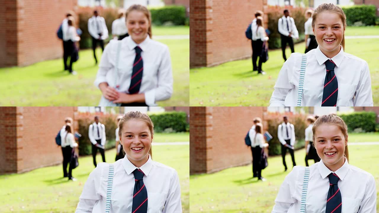 在校外穿着制服的女少年学生的肖像