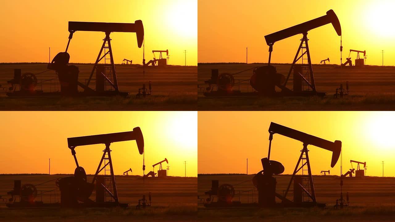 日落时抽油井钻井平台采油勘探石油开采