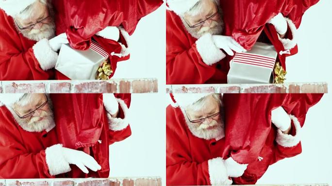 圣诞老人将礼品盒放入烟囱