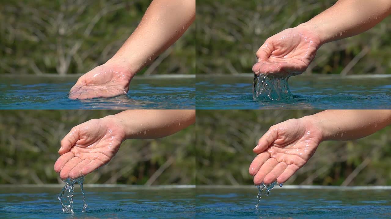 慢动作: 女性手舀水，水滴落在游泳池表面