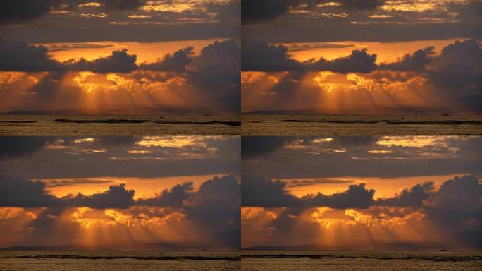 日出云和大海。印度尼西亚巴厘岛沙努尔海滩的景色