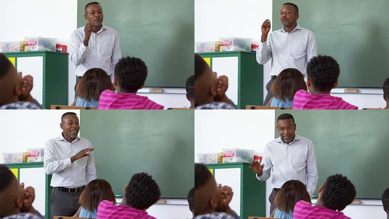 老师在小学课上与孩子们交谈