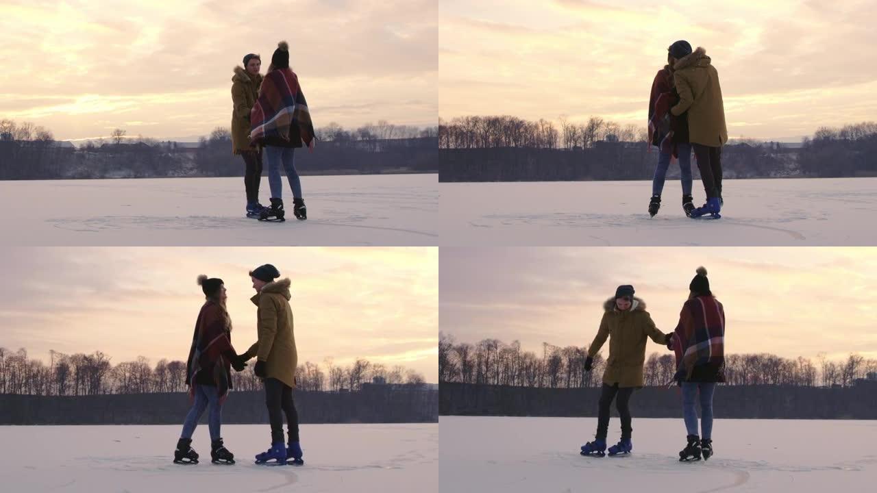4k浪漫情侣在冰冻的湖上滑冰接吻，慢动作