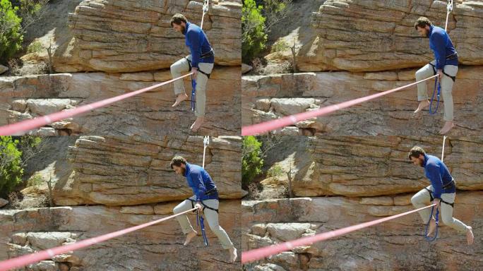 登山者试图在绳索上走钢丝4k