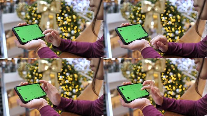 在购物中心使用智能手机绿屏，水平