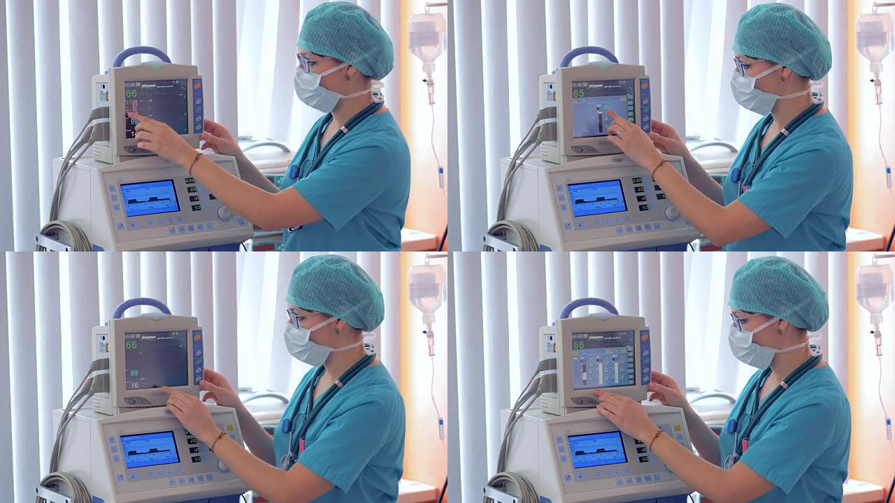 麻醉师在手术室用心电描记器工作。
